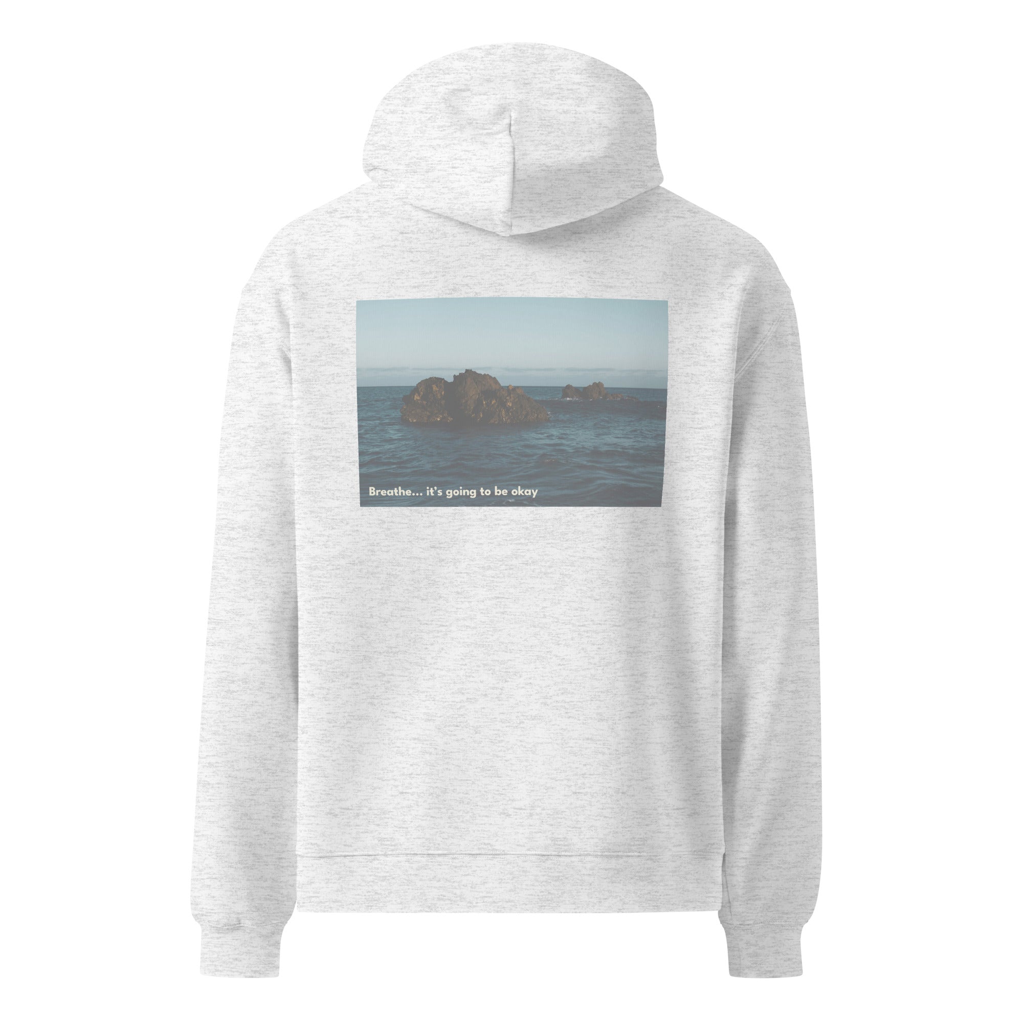 Gray hoodie with a scenic print on the chest on a white background