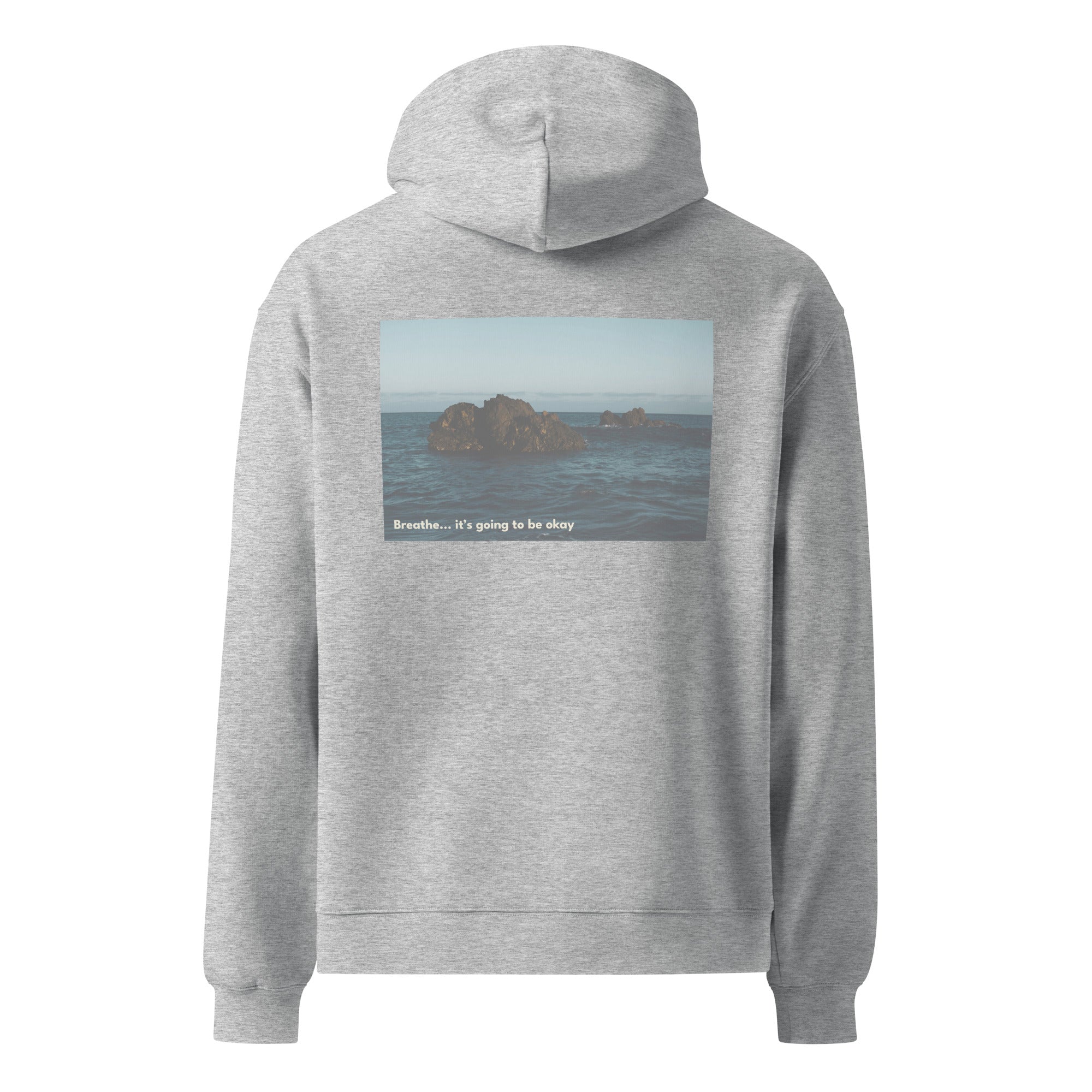 Gray hoodie with a scenic print on the back on a white background