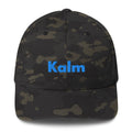 Camouflage cap with 'Kalm' text on a white background